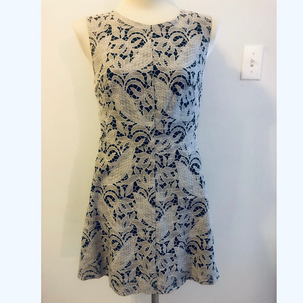 H&M white lace over black mini dress Sz 10